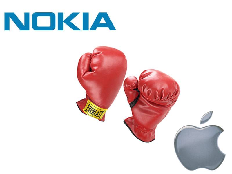 Торговая комиссия встает на сторону Nokia в споре с Apple. Торговая комиссия встает на сторону Nokia в споре с Apple. Фото.