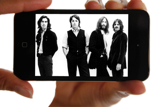 Beatles + Apple iTunes = успех и всплеск музыкальных продаж. Beatles + Apple iTunes = успех и всплеск музыкальных продаж. Фото.