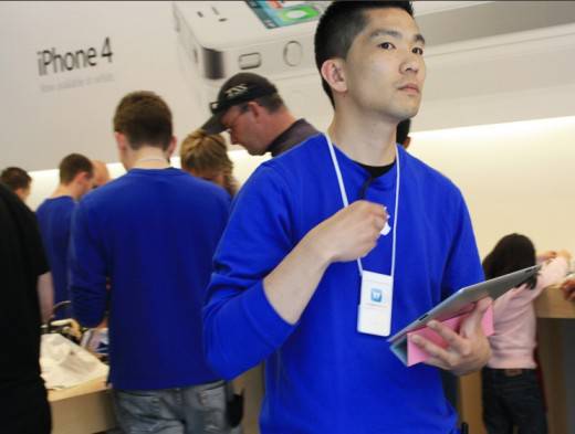 101782-an-apple-store-employee-is-seen-at-the-companys-stockton-street-store-
