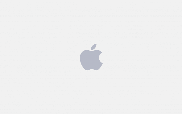 Серый логотип Apple на сером фоне Серый логотип Apple на сером фоне