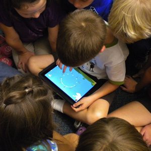 iPad положительно влияет на результаты в школе. Фото.