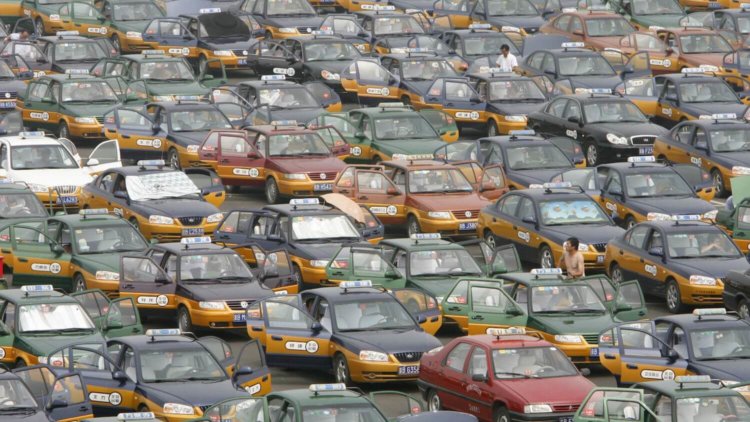 [Что происходит?] Apple вложила миллиард в китайское такси. Фото.