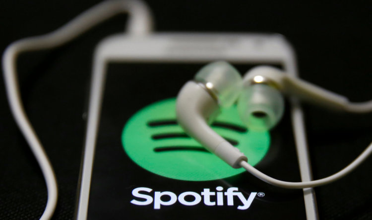 Apple Music стремительно догоняет Spotify. Фото.