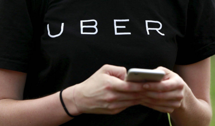 Apple внезапно стала инвестором Uber. Фото.