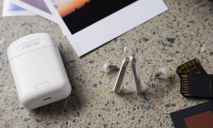 Слуховые аппараты для iPhone. Слуховые аппараты Signia Styletto — почти полная копия обычных наушников. Фото.