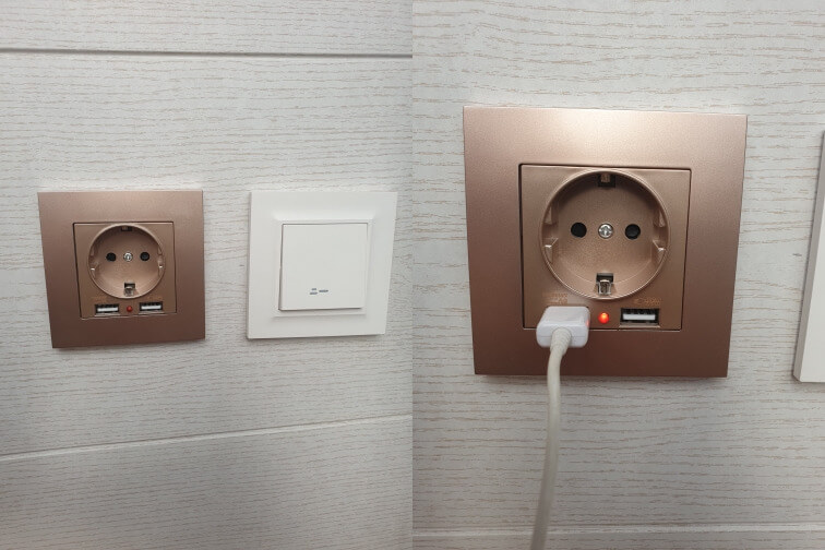 USB-разъемы в розетке позволят не занимать саму розетку блоком питания. Фото.