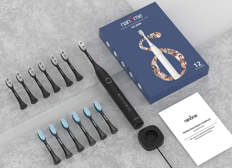 Звуковая зубная щётка. Nandme NX8000 имеет вертикальную зарядку-кредл. Звуковая зубная щётка. Nandme NX8000 имеет вертикальную зарядку-кредл. Фото.