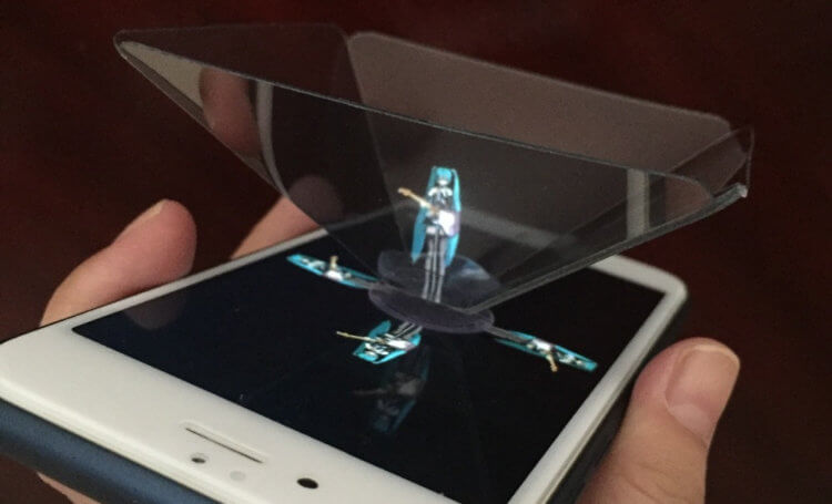 Pyramid for 3D hologram.  It looks cool, but this thing has absolutely no use.  A photo.