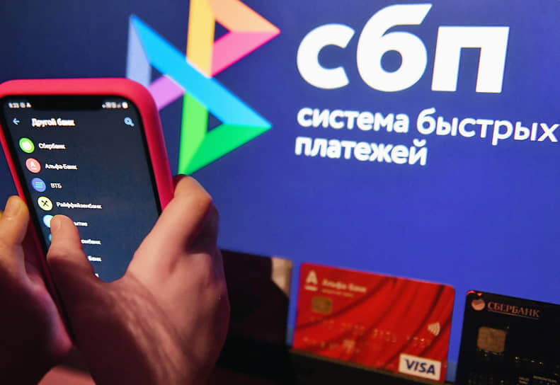СБПэй действительно позволяет платить Айфоном по NFC. Фото.