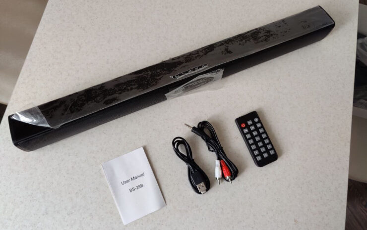 Недорогой саундбар для телевизора. Этот саундбар можно подключить к ТВ как по кабелю, так и по блютуз. Фото.