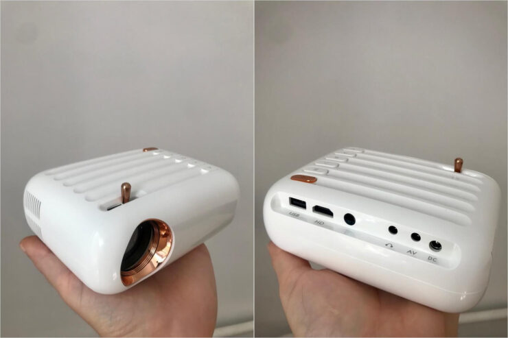 Проектор стоит намного дешевле телевизоров, но позволяет имитировать экран диагональю до 140 дюймов. Фото.