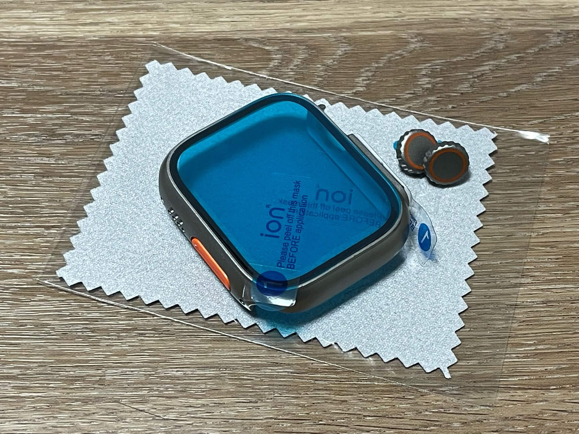 Protective case for Apple Watch.  The pad comes with two Digital Crown wheels.  Photo.