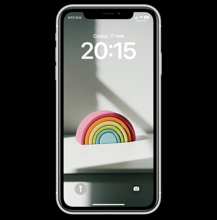 Обои с радугой на Айфон. Здесь цвета не такие яркие, но смотрятся обои очень круто. Фото.