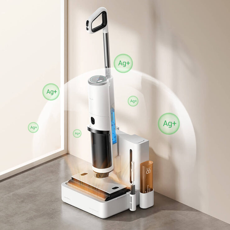 Вертикальный пылесос с сухой и влажной уборкой. Кстати, на зарядной станции происходит ионизация, что позволяет уничтожить до 99,9% бактерий. Вертикальный пылесос с сухой и влажной уборкой. Кстати, на зарядной станции происходит ионизация, что позволяет уничтожить до 99,9% бактерий. Фото.