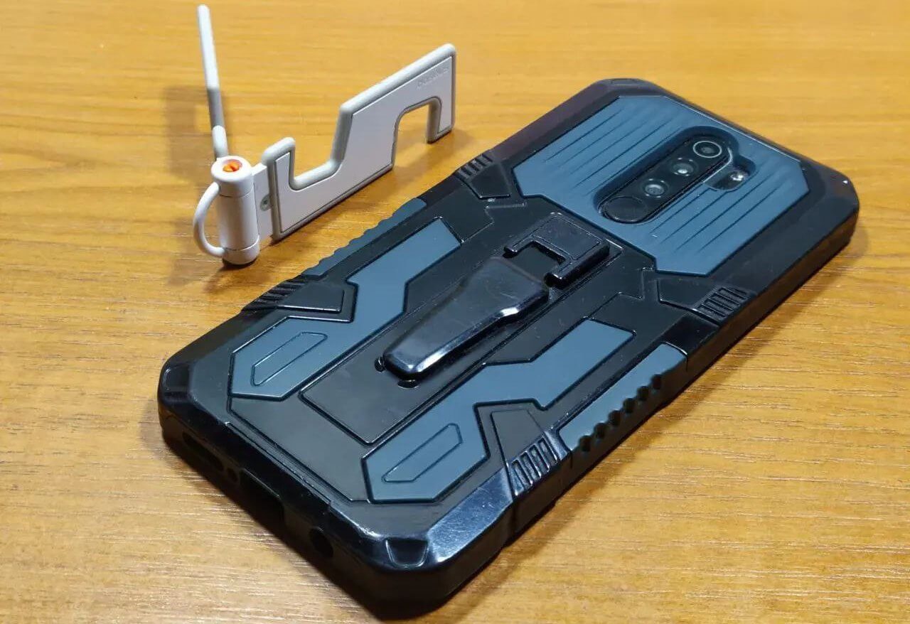 Дешёвая подставка для смартфона. Только что заказал себе эту подставку, но думаю, что не разочаруюсь в ней. Фото.