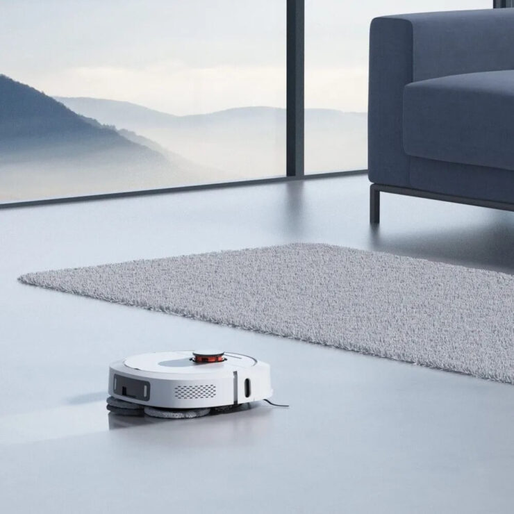 Робот-пылесос с влажной уборкой. Перед ковром Roidmi Eva 2023 просто поднимет швабру, и не намочит его. Робот-пылесос с влажной уборкой. Перед ковром Roidmi Eva 2023 просто поднимет швабру, и не намочит его. Фото.