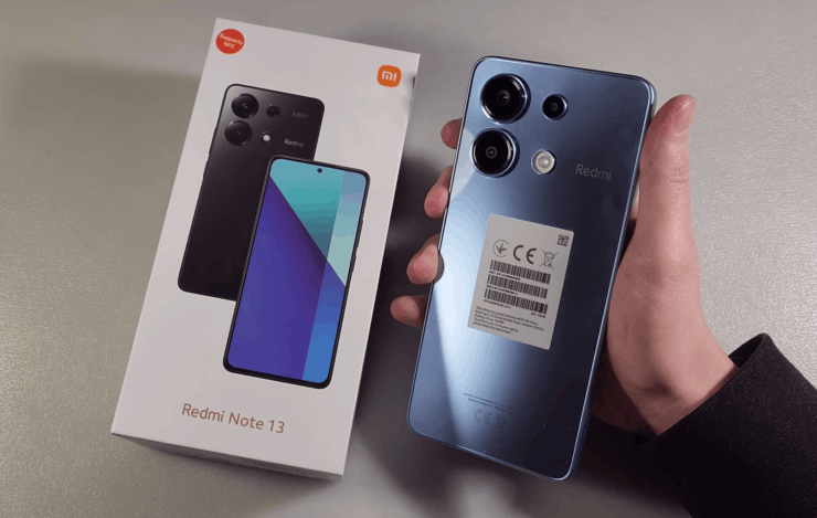 Redmi Note 13 — недорогой смартфон на Андроиде. Смартфон получил прикольный глянцевый корпус, который здорово переливается на солнце. Изображение: youtube.com. Redmi Note 13 — недорогой смартфон на Андроиде. Смартфон получил прикольный глянцевый корпус, который здорово переливается на солнце. Изображение: youtube.com. Фото.