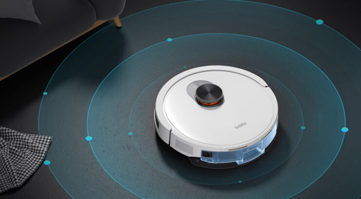 Робот-пылесос с самоочисткой. Пылесос найдет весь мусор, а потом сбросит его в станцию самоочистки. Фото.