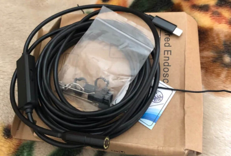 Эндоскоп для смартфона. Этот эндоскоп можно использовать даже во влажной среде. Эндоскоп для смартфона. Этот эндоскоп можно использовать даже во влажной среде. Фото.