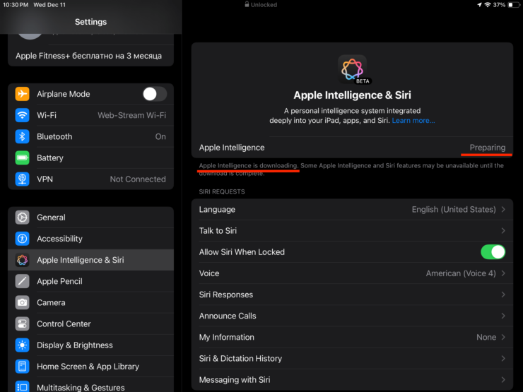 Как включить Apple Intelligence. iPad загружает данные для Apple Intelligence. Фото.