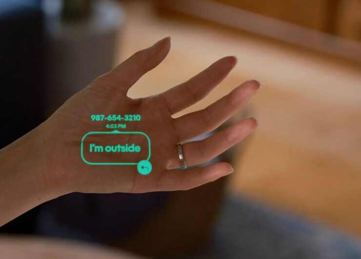 Устройство со встроенным ChatGPT. Идея AI Pin от Humane состояла в том, чтобы заменить экран проектором. Но Айв хочет вообще отказаться от дисплея. Фото: Wylsacom. Фото.