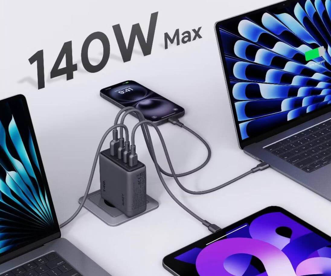 Мощное зарядное устройство на 140 Вт. Зарядное устройство Aukey может заряжать все и сразу на максимальной мощности. Мощное зарядное устройство на 140 Вт. Зарядное устройство Aukey может заряжать все и сразу на максимальной мощности. Фото.