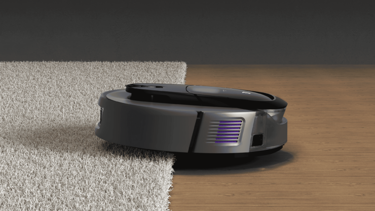 Робот-пылесос для уборки ковров. Перед заездом на ковер влажная тряпка будет поднята. Фото.