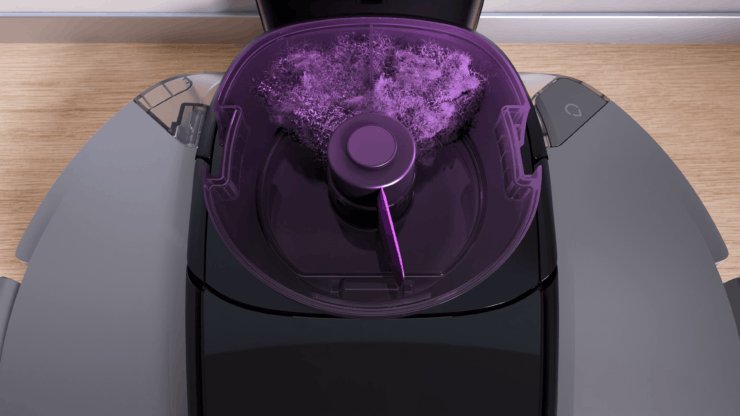 Контейнер для робота-пылесоса. Пыль и мусор внутри контейнера спрессовываются, и вы можете не чистить устройство до 60 дней. Фото.