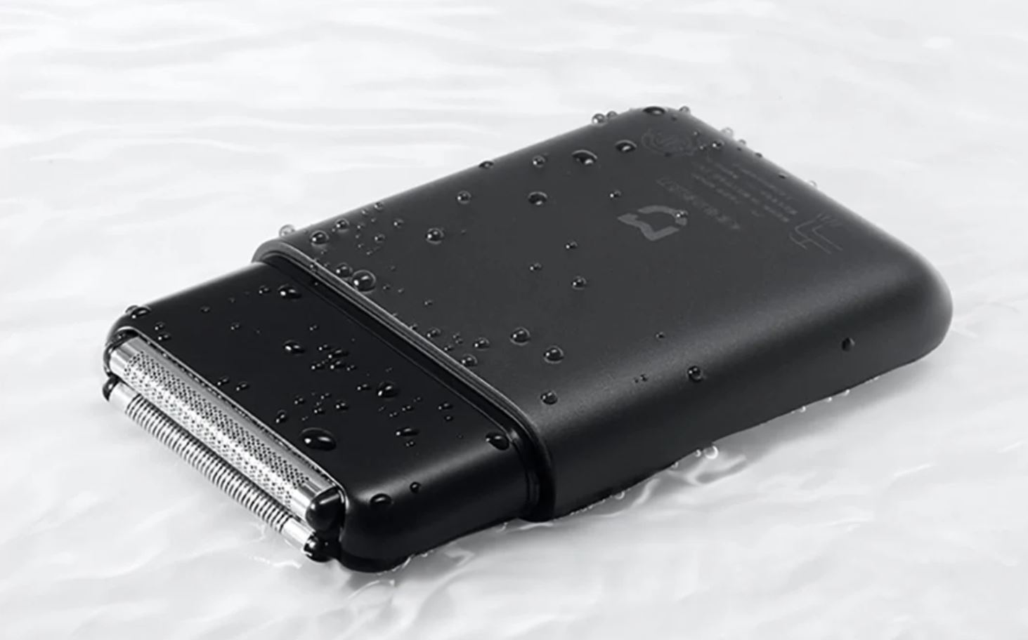 Компактная электробритва Xiaomi. Бритва Xiaomi компактна и хороша в использовании. Компактная электробритва Xiaomi. Бритва Xiaomi компактна и хороша в использовании. Фото.