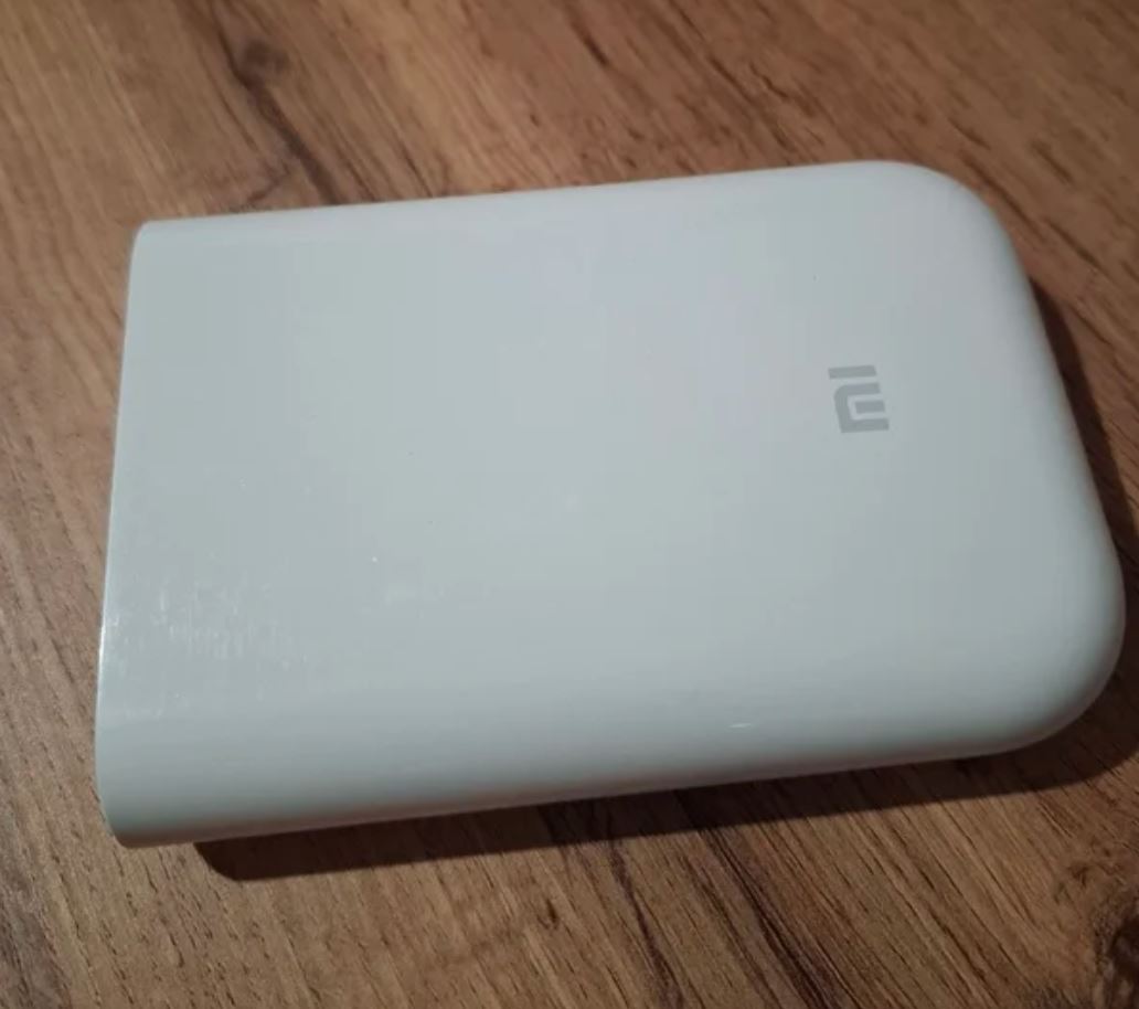 Мини-принтер Xiaomi для печати фото. Принтер Xiaomi поможет сохранить любимые моменты в печатном формате. Фото.