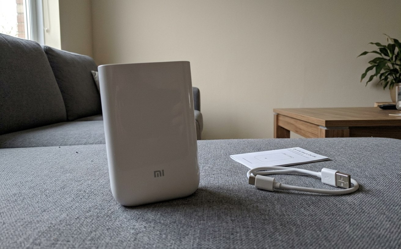 Карманный фотопринтер Xiaomi для снимков со смартфона. Печатайте фотографии со смартфона сразу. Фото.