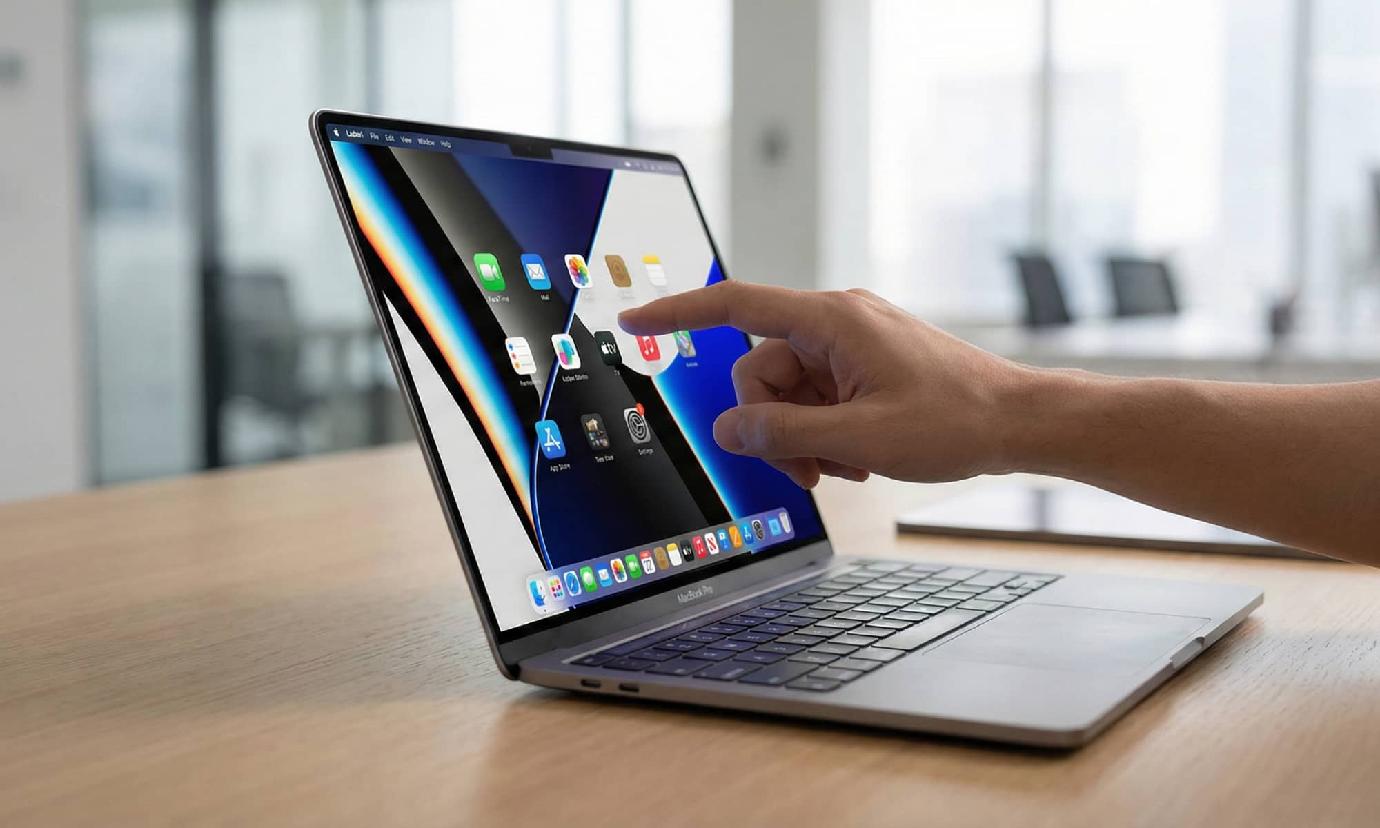 Чем новинка удивит и сколько может стоить. Тачскрин в новом MacBook с OLED-экраном. Фото.